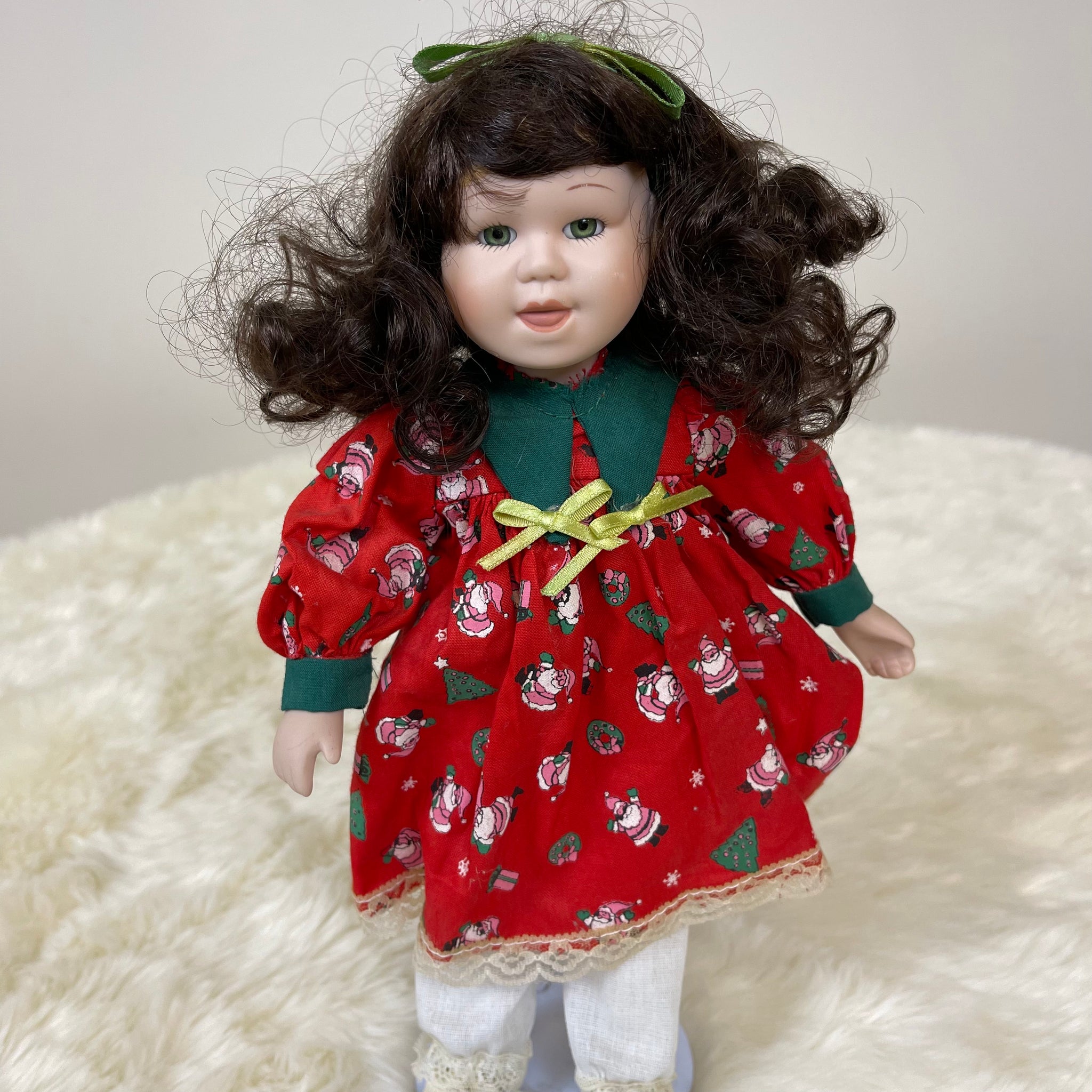 Vintage Porcelain Doll Wearing Christmas Dress