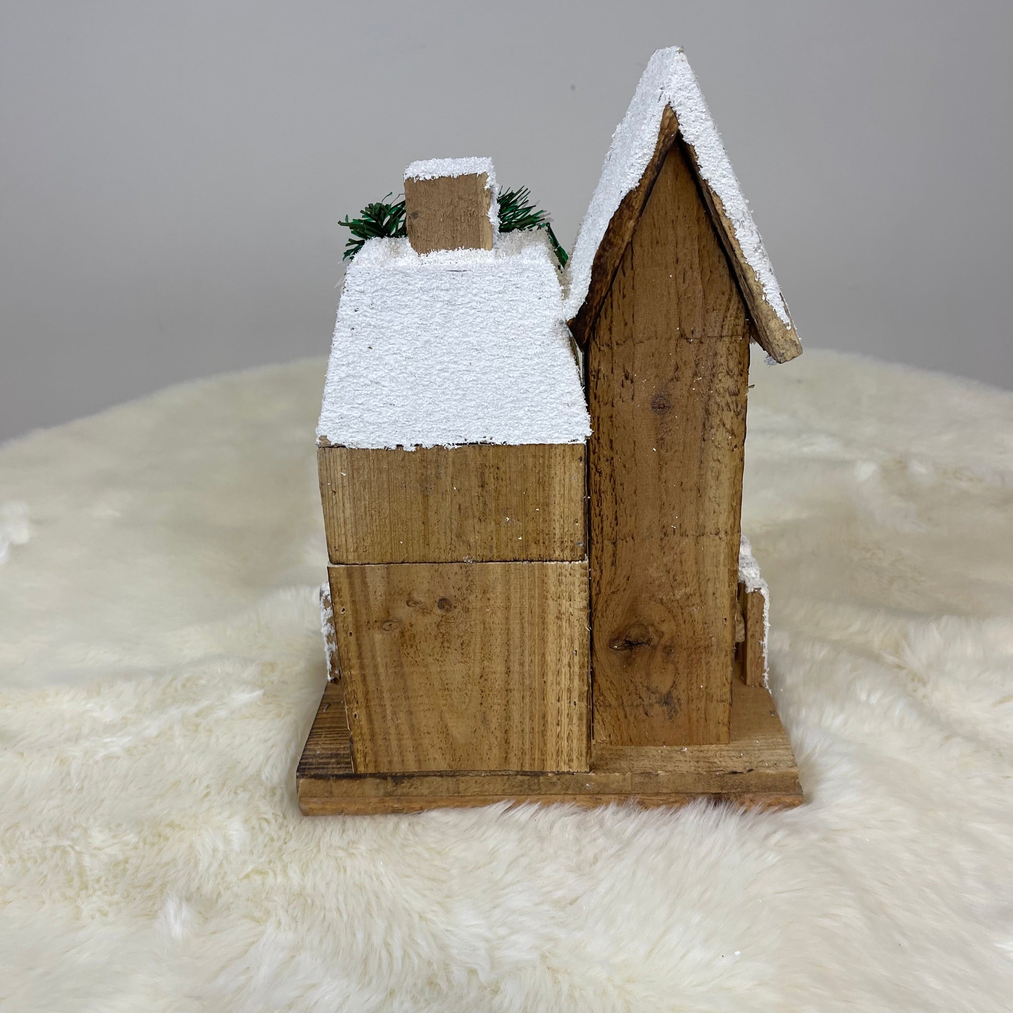 Wooden Christmas Lodge with Lights Inside