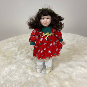 Vintage Porcelain Doll Wearing Christmas Dress