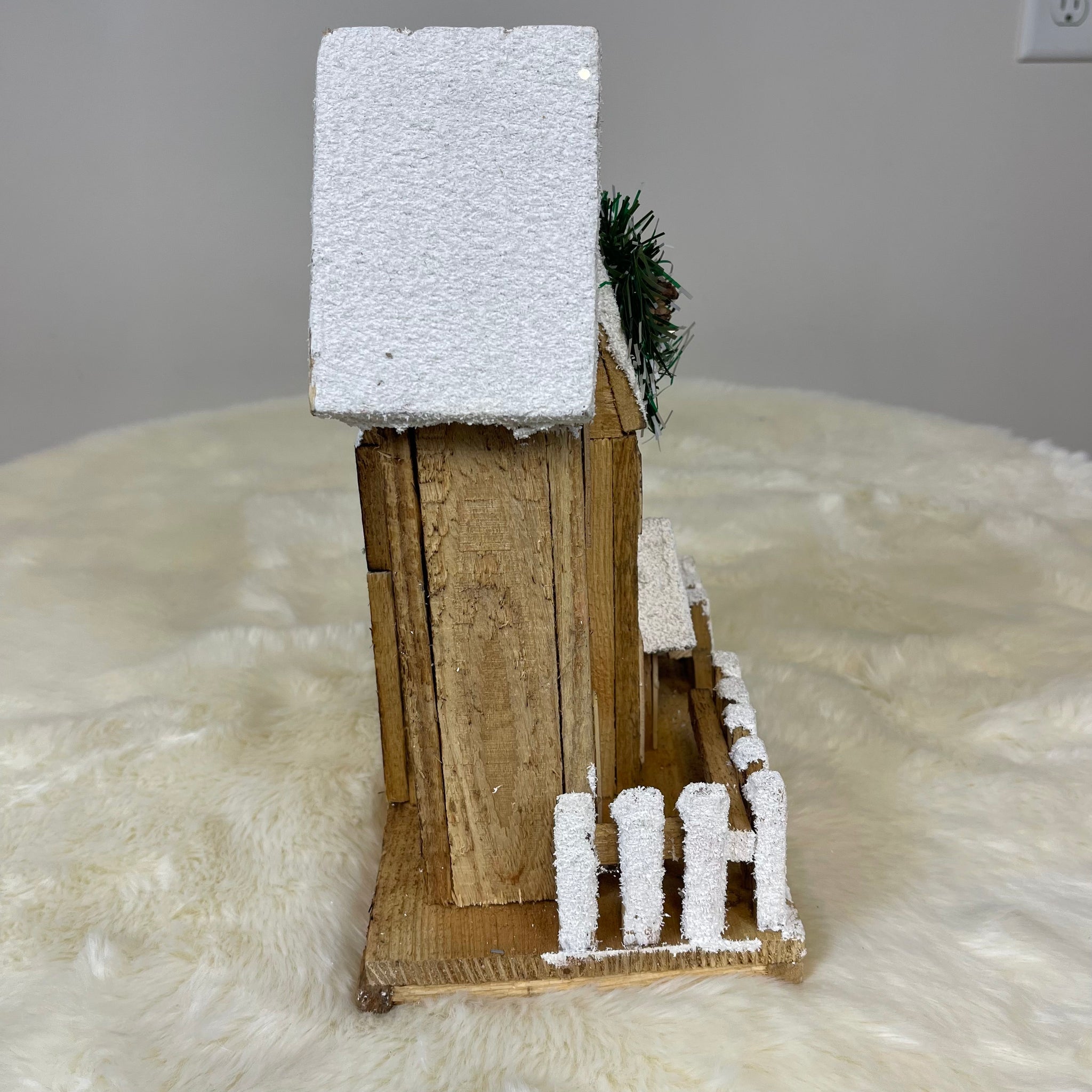 Wooden Christmas Lodge with Lights Inside